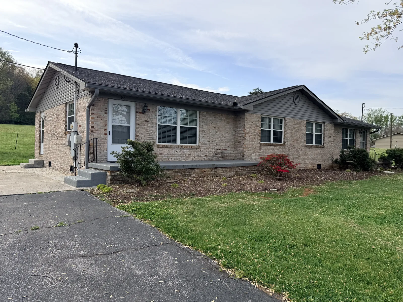 144 Fox Rd — brick duplex exterior